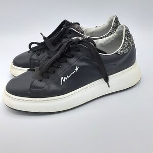Meline Black Leather Lack Up Platform Sneaker.